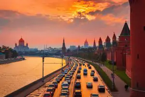 Traffic at sunset near Kremlin wall in Moscow, Russia.