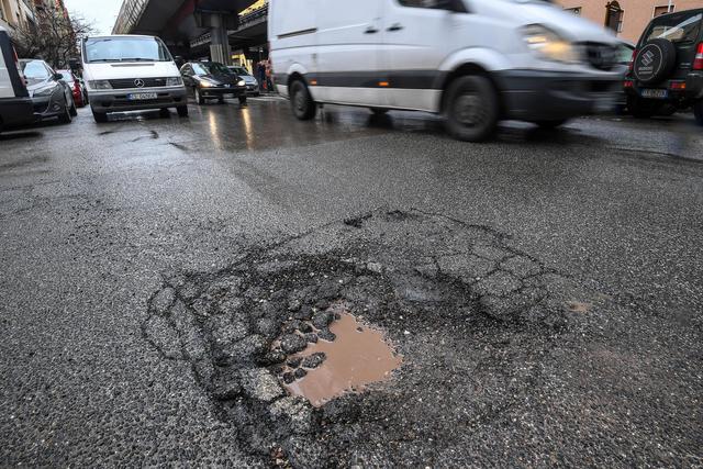 roma maltempo buche