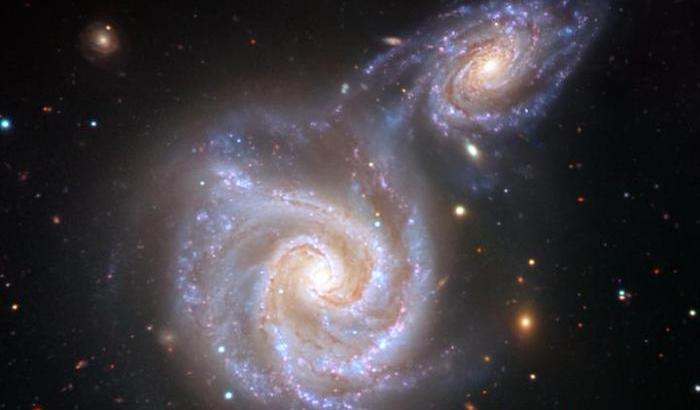 Rappresentazione artistica dello scontro tra la Via Lattea e la galassia Salsiccia