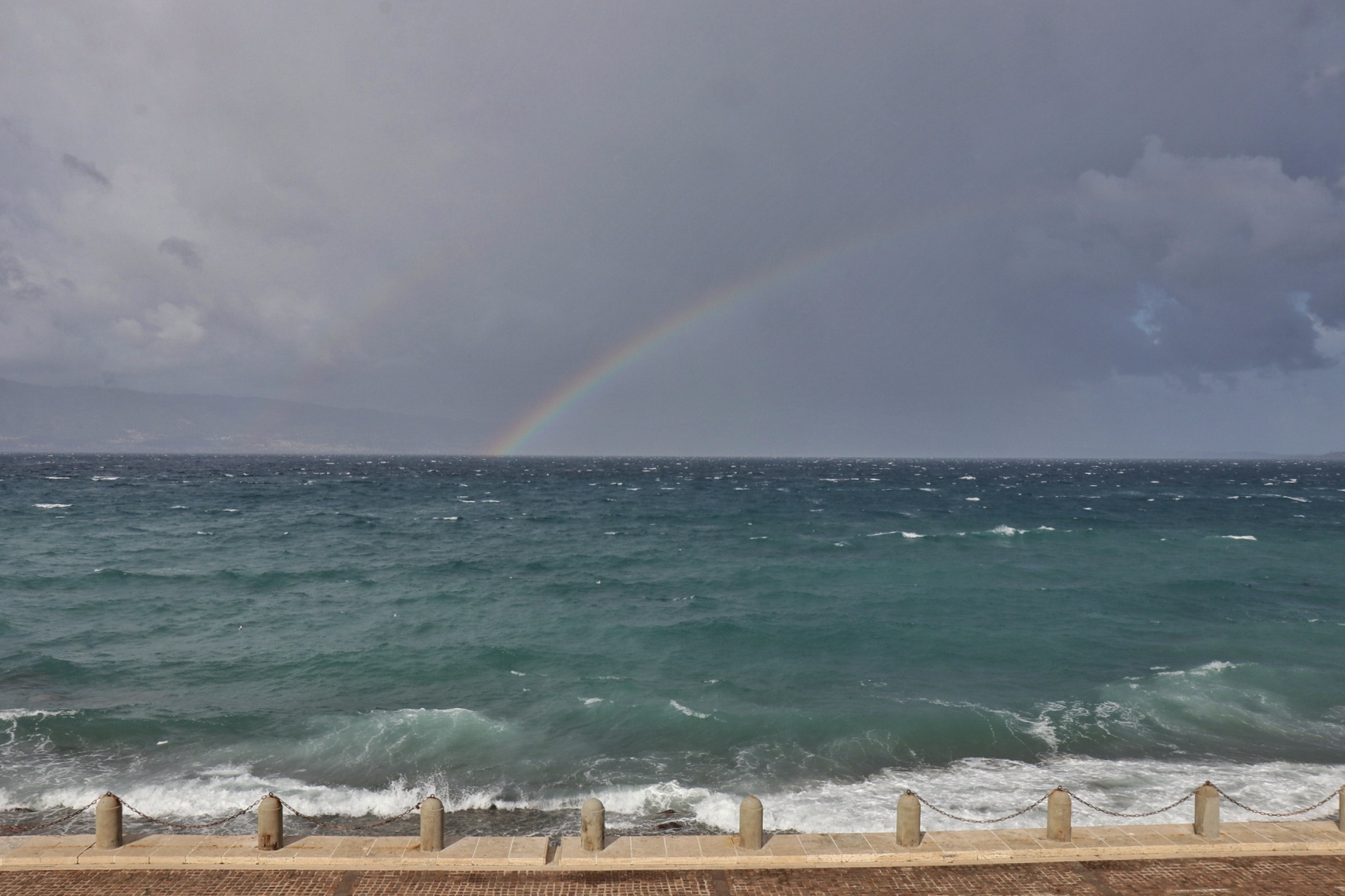 arcobaleno mareggiata maltempo Reggio Calabria