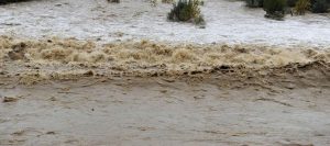 piena fiume torrente maltempo